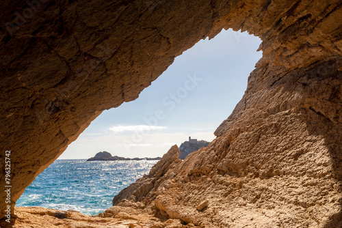 The inclined cave, Punta Grossa cape, Cala de Sant Vicent cove, Sant Joan de Labritja, Ibiza, Balearic Islands, Spain photo