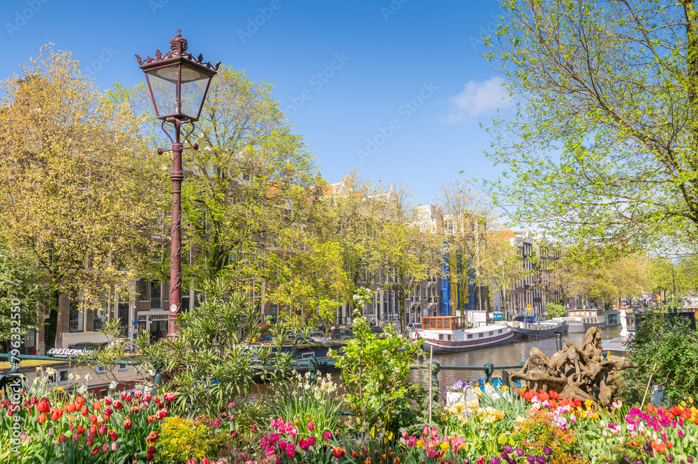 Colorful flowers and lamp post in Amsterdam, Netherlands