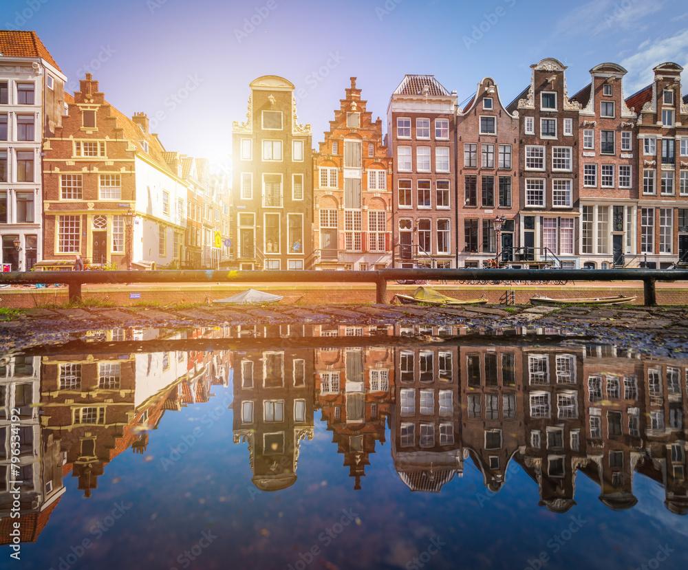 Sunrise and reflection of Amsterdam houses