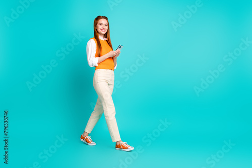 Profile photo of charming lovely girl blogger wear trendy orange clothes isolated on cyan color background