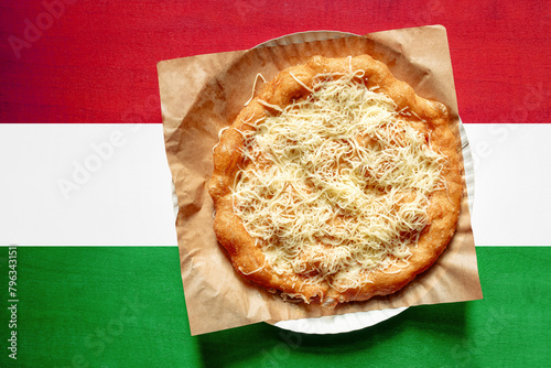 Langos with Hungary flag on wooden background