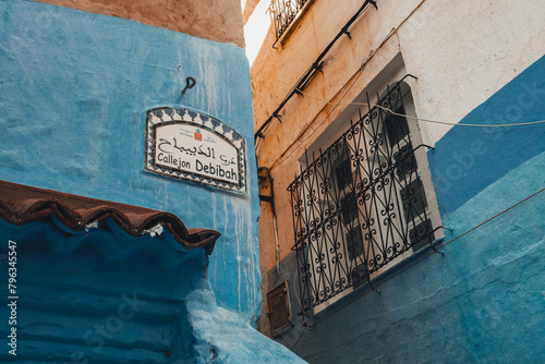 Chefchaouen, Morocco - 16.03.2024: Callejon Debibah street sign at Chefchaouen aka El Aiún also known as the Blue City. © Rui