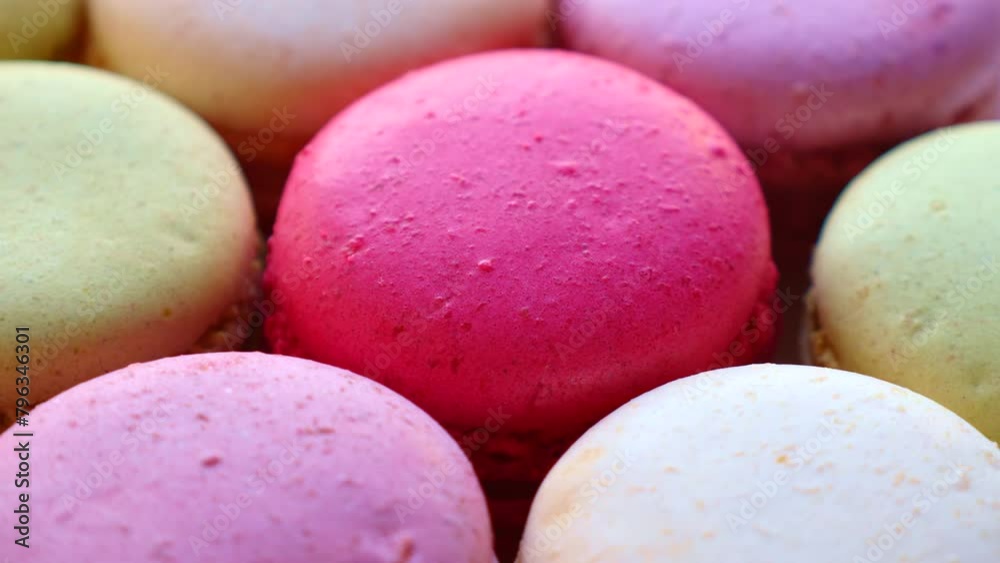 Bright colorful macaron buiscuits circle rotation close up
