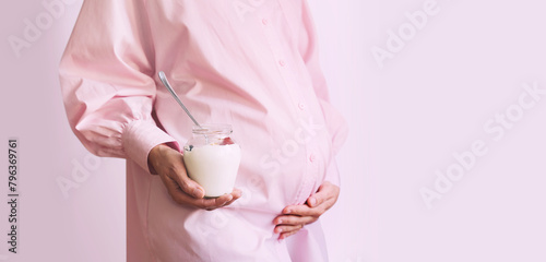 Nutrition during pregnancy. Pregnant woman with healthy food.