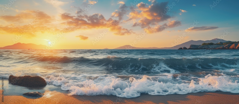 View of waves crashing on sandy beach View of waves crashing on sandy beach