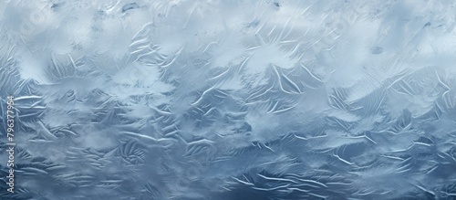 Frosty window against sky photo