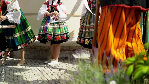Łowicz Corpus Christi celebration. People in traditional Masovian costumes. Slow motion video. Polish folklore photo