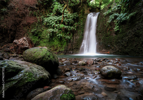 Beautiful waterfall hidden in the Azores islands forest © rangizzz