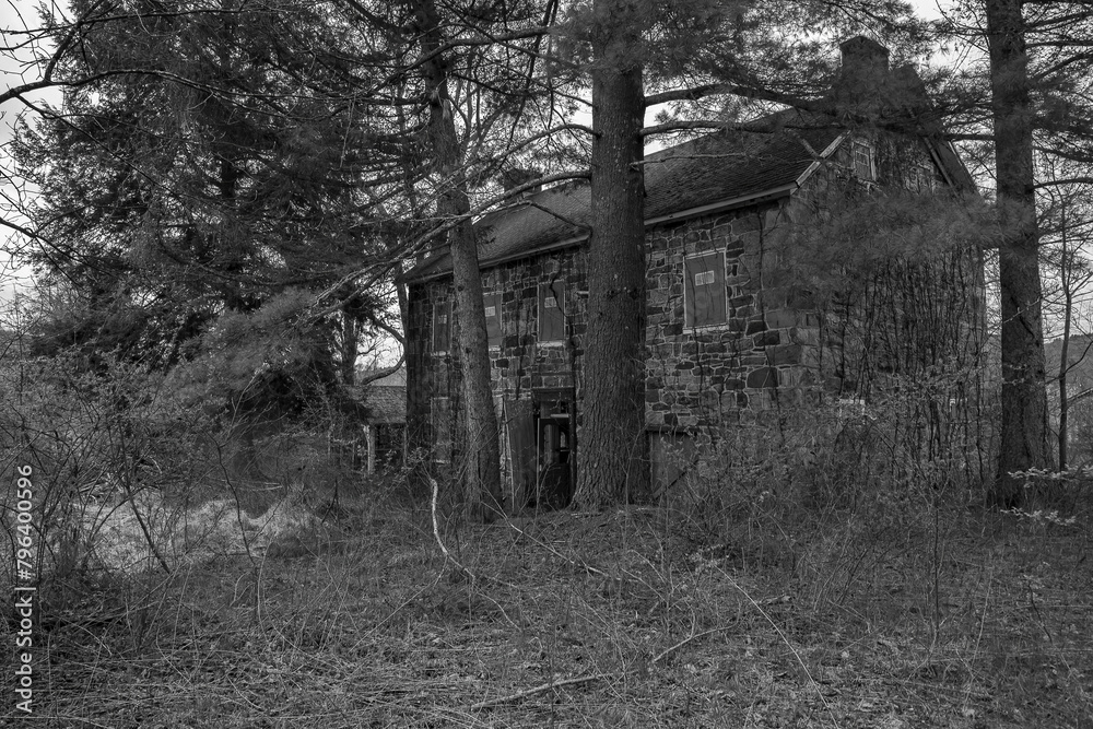 Abandoned farmhouse in the Delaware Water Gap  National Recreation Area in black and white
