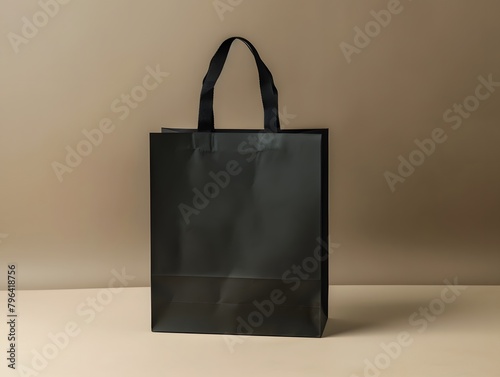Black paper bag mockup on neutral background