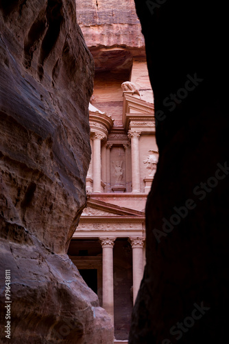 A glimpse of The Treasury from the canyon in the archeological site of Petra in Jordan