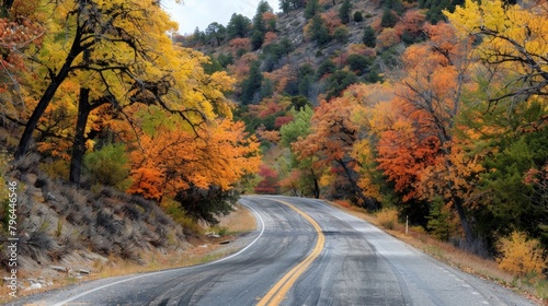 A scenic mountain road lined with colorful autumn trees leads to a secluded valley where an ancient Native American trading post still . AI generation.