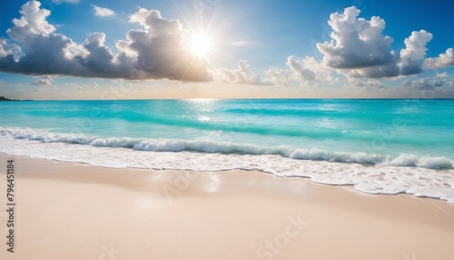 Sunset over the ocean  with waves gently lapping at the shore and a golden sky dotted with clouds. Wide-angle shot of a tranquil beach with white foam on the shore  vivid turquoise waters. 