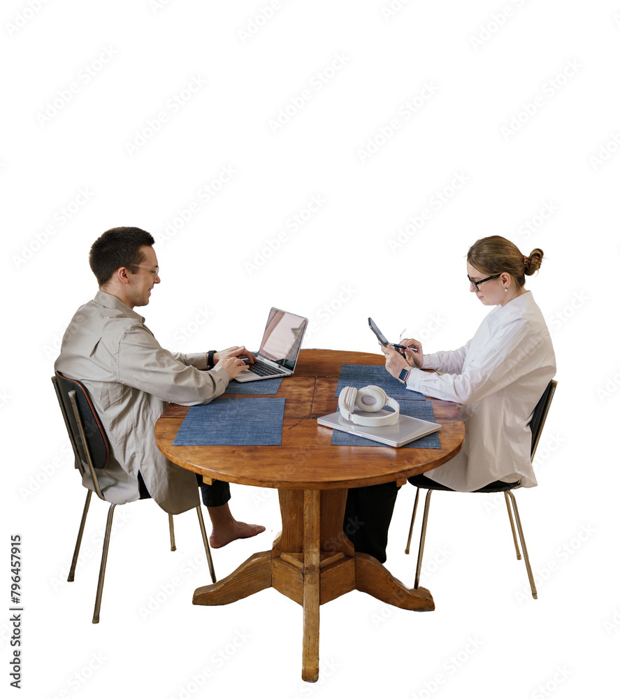 A couple of people working together using laptops workplace, cut out A couple of people working together using laptops workplace, cut out