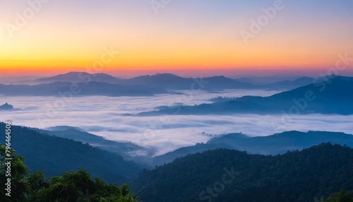 nature view of mountainnforest landscape with sunrise and mist in the morning natural scenery outdoor travel background © Diann