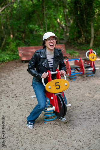 young woman has fun as a child