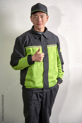 Asian gas station male employee