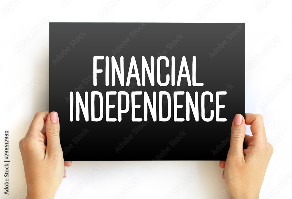 Financial independence - status of having enough income or wealth sufficient to pay one's living expenses for the rest of one's life, text concept on card Financial independence - status of having enough income or wealth sufficient to pay one's living expenses for the rest of one's life, text concept on card