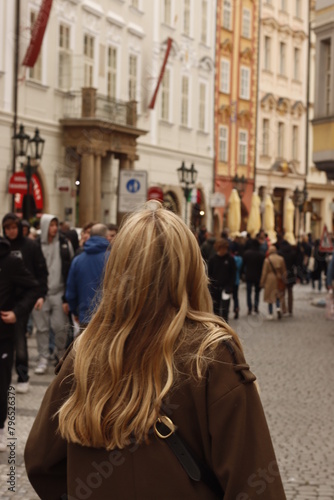 Blonde woman in the old town of Prague, Czech Republic