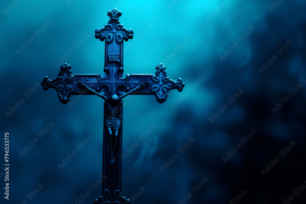 A Christian crucifix, the cross is in a misty ethereal Gothic atmosphere of mist and ghostly dark blue darkness, stock illustration image