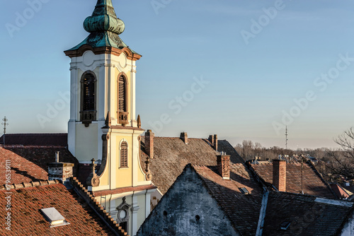 View of Blagovestenska church among old tile roofs. Szentendre, Hungary