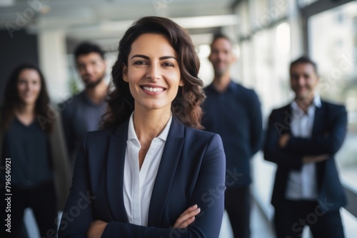 Confident business leader standing smiling office. photo