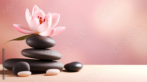 Lotus flower and stone, symbolizing spa advertising