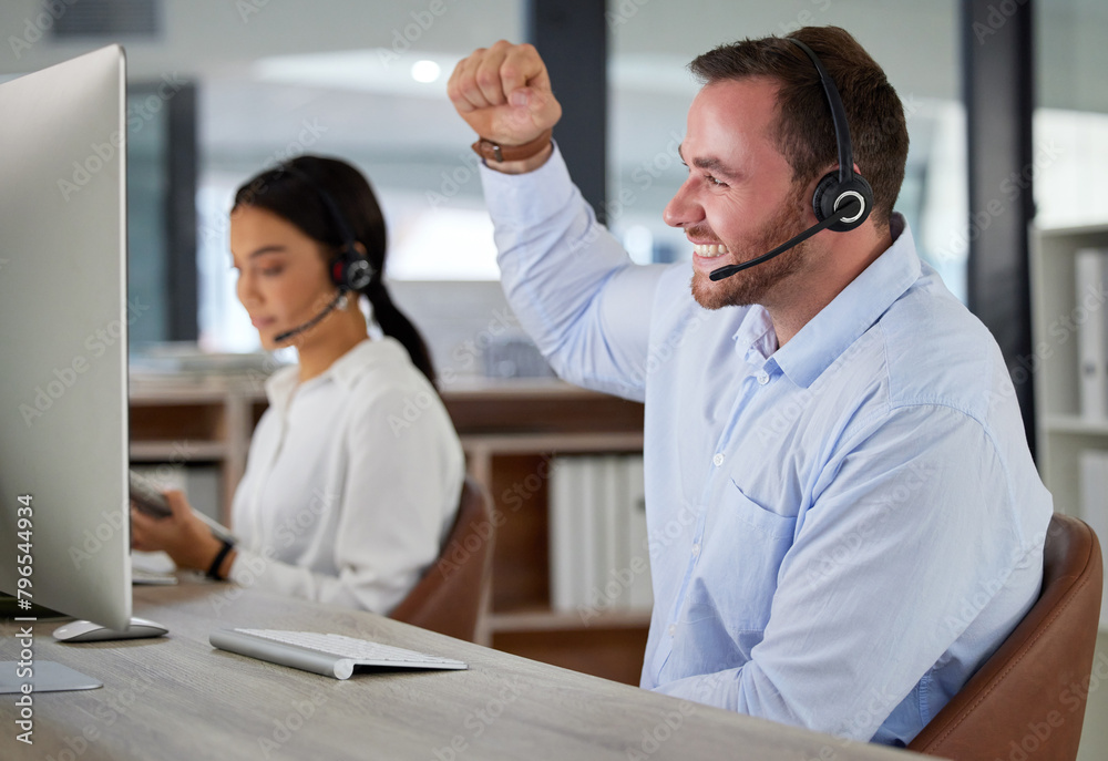 Man, celebration and office of call center for business inbound telemarketing, sales service and crm. Advisor or agent, happy and cheer for kpi target achievements or customer feedback and fist pump. Man, celebration and office of call center for business inbound telemarketing, sales service and crm. Advisor or agent, happy and cheer for kpi target achievements or customer feedback and fist pump.