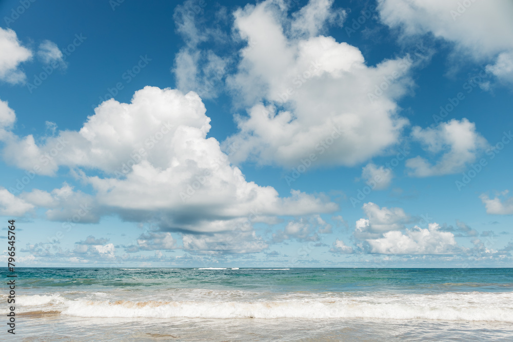 View of a tropical beach with clouds on the horizon in Porto de Galinhas, Brazil. View of a tropical beach with clouds on the horizon in Porto de Galinhas, Brazil.