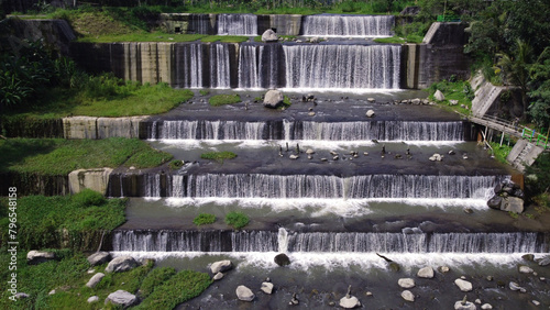 Aerial photo of the Watu Purbo Sabo Dam in Sleman, Indonesia which has a 6-level water dam. Apart from preventing the eruption of Mount Merapi, this dam is also a popular tourist destination