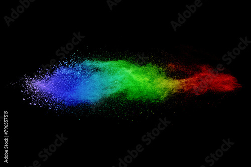 abstract powder splatted background. Freeze motion multicolor powder explosion on black background