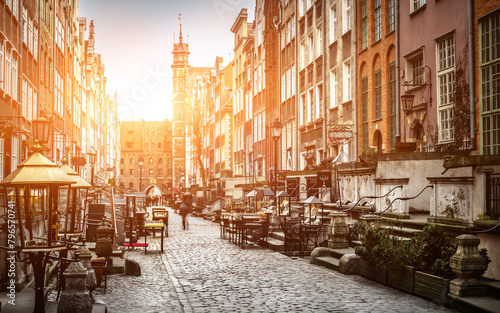 Architecture of Mariacka street in Gdansk is one of the most interesting tourist attractions and sightseeing places in Gdansk at sunset. photo