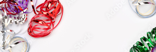 Frame made of ribbons on a blue background. Banner with festive composition.