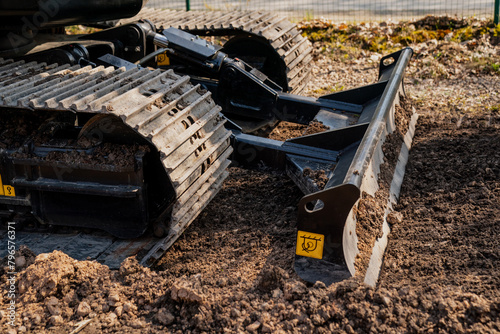 Wallpaper Mural Construction excavator working close up on construction job site Torontodigital.ca