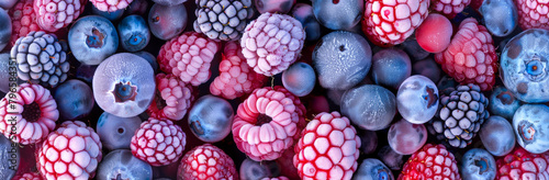 Mix of frozen berries, blueberries and raspberries, closeup photo from above, natural organic vegan raw food ingredient. photo