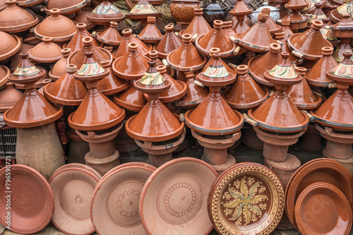 Earthenware tajine pots for sale in souk of Marrakech, Morocco © parkerspics