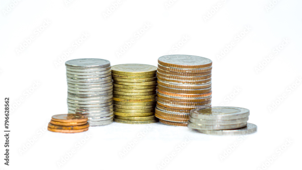 Many Thai baht coins arranged in neat layers on a white background, isolated Many Thai baht coins arranged in neat layers on a white background, isolated