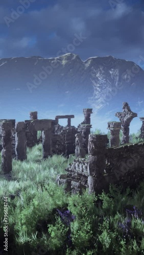 Ruins of ancient gothic castle on hill photo