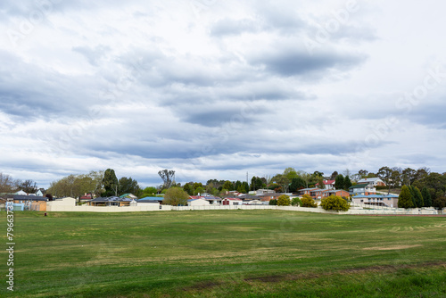 Empty cricket pitch sports area in country town under big sky