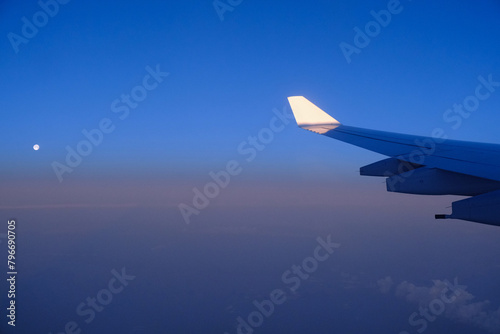 Airbus A340 313 wing,moon and first light