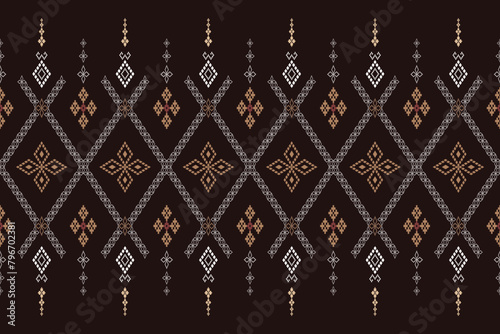 Beautiful traditional ethnic motifs ikat geometric fabric pattern cross stitch.Ikat embroidery Ethnic oriental Pixel.Abstract,vector,illustration. Texture,scarf,decoration,wallpaper,curtain,sarong. photo