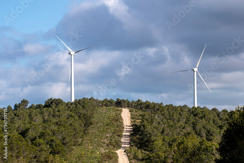Capturing the essence of green energy innovations, these wind turbines stand tall in Tarragona, Catalonia, Spain, signaling a commitment to environmental sustainability photo