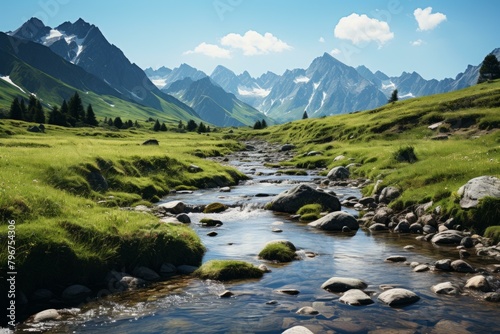 b'A river flowing through a lush green valley with snow-capped mountains in the distance'
