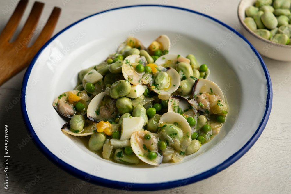 Beans with peas and clams. Traditional tapa from northern Spain. Beans with peas and clams. Traditional tapa from northern Spain.