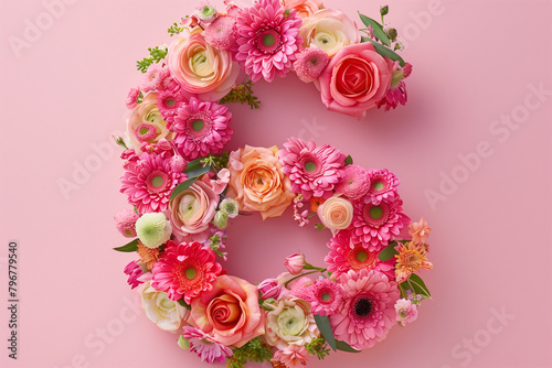 Vibrant Floral Number Six. Top-view of a vibrant floral number six on pink background, perfect for celebrations.