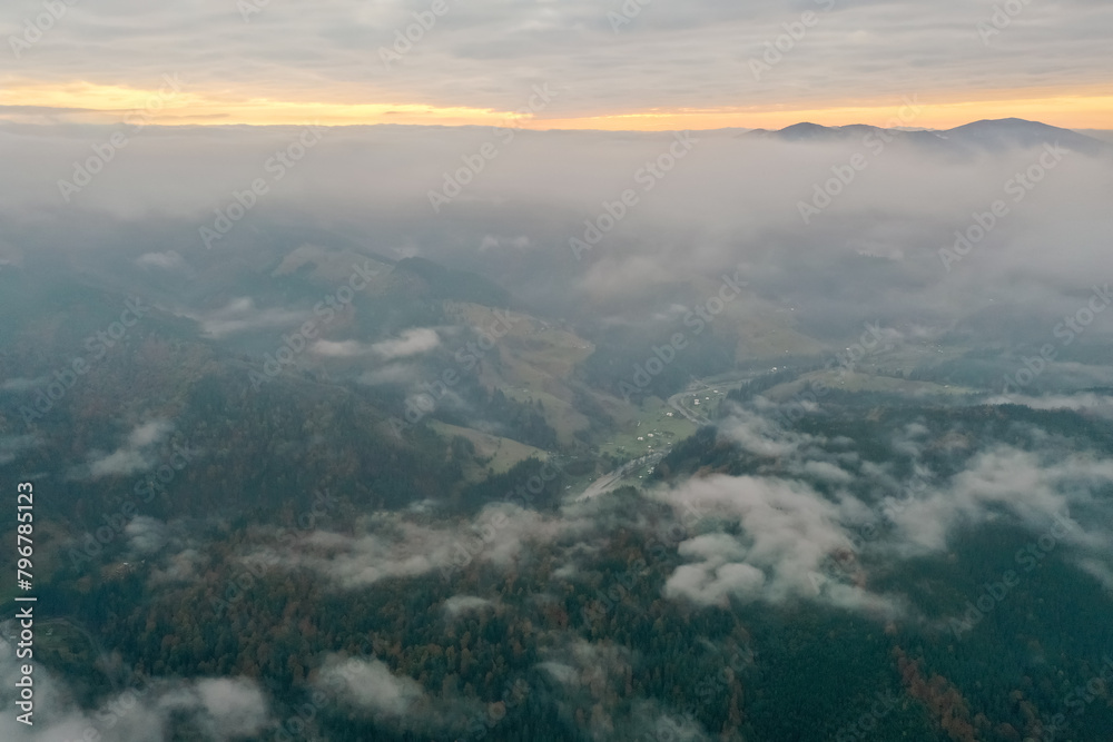 Aerial view of beautiful mountains on cloudy day