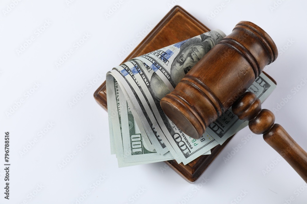 Judge's gavel and money on white background, top view. Space for text