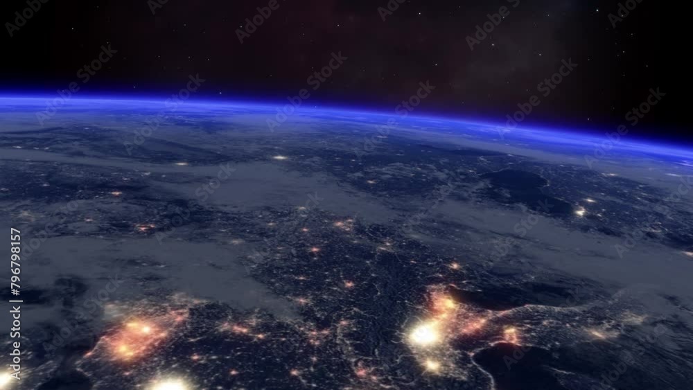 Flying at high altitude over land, sea, and clouds at night, with the stars in space revealed behind the blue glow of the horizon. To learn how you can customize this animation, see my profile. Flying at high altitude over land, sea, and clouds at night, with the stars in space revealed behind the blue glow of the horizon. To learn how you can customize this animation, see my profile.