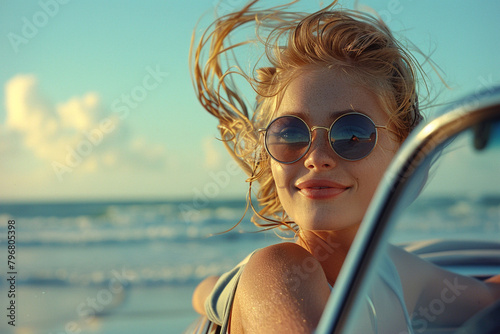 portrait of a woman in sunglasses and car at beach © Muhammad