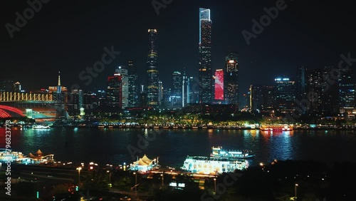 Wallpaper Mural Guangzhou skyline by night with radiant towers and a traditional boat on the Pearl River Torontodigital.ca